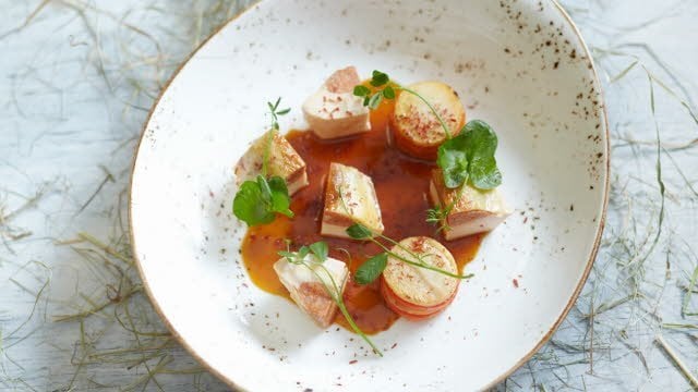 Maïskip gevuld met merquez en paprika jus Maïskip gevuld met merquez en paprika jus