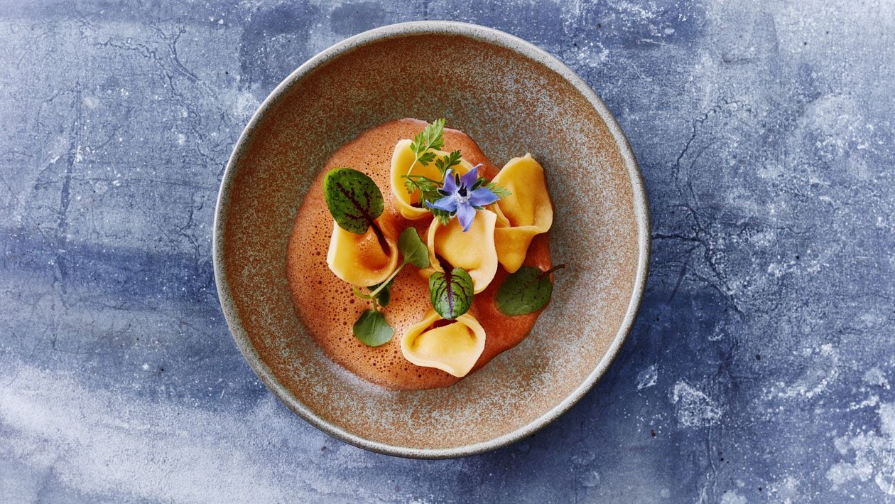 Tortellini van garnalen met een roomsaus van schaaldieren