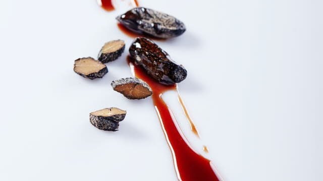 Gereduceerde jus met tonkabonen