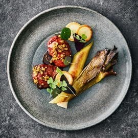 Varkenswangetjes met bruin bier, prei en aardappel poffertjes