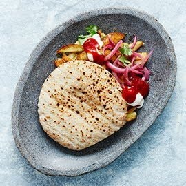 Shoarma van knolselderij met gezouten citroen en chipotle Shoarma van knolselderij met gezouten citroen en chipotle