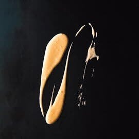 Jus van kokos en rode curry