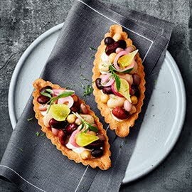 Tartelette met boontjes, roomkaas en limoen