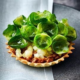 Tartelette met lams rendang en spruiten Tartelette met lams rendang en spruiten