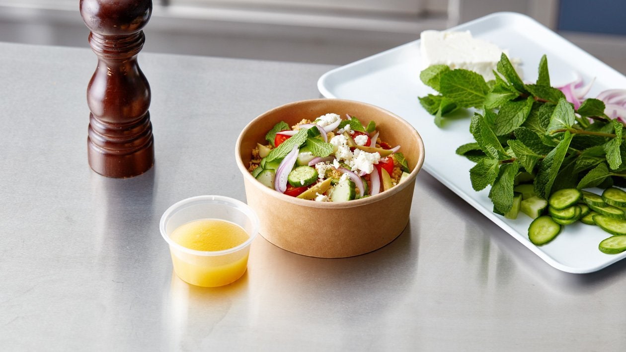 Griekse salade met taboulé en citrus vinaigrette (delivery)