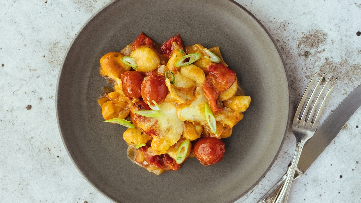 Stoofpotje met gnocchi, tomaat en gepofte paprika