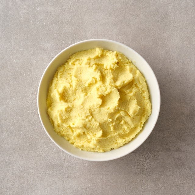 Aardappelpuree met kerrie en knoflook